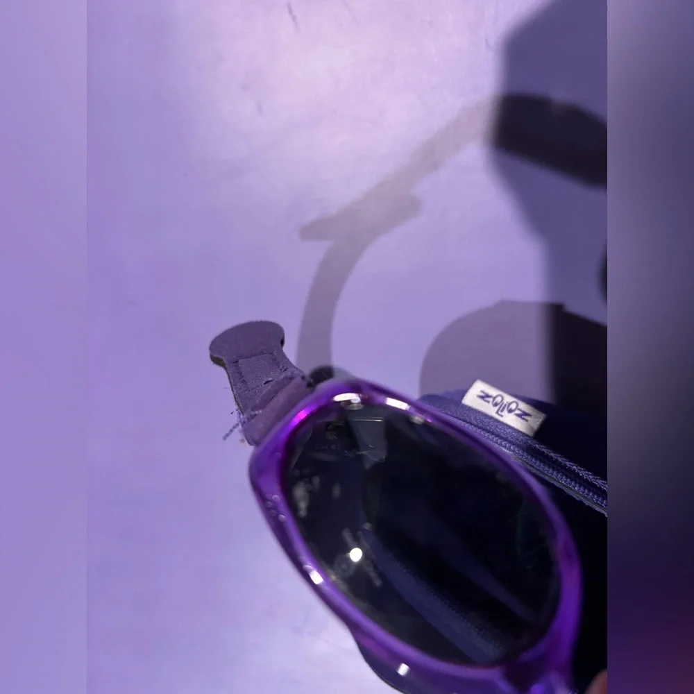 Baby sunglasses. Approx Sz 6-18 months. Velcro is adjustable. Comes with case.